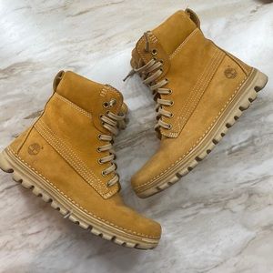 Used Timberland boots. Size 6 womens. They are like a dark tan/gold color.